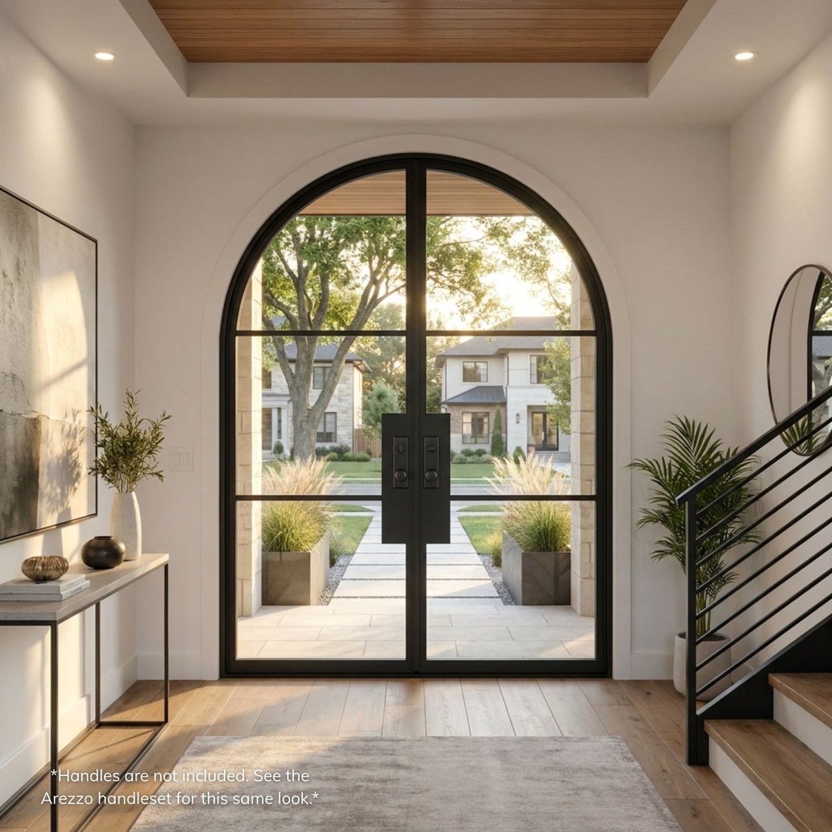 3-lite French steel entry double door, arch top design, matte black finish with full-view glass panels, viewed from the interior of a modern foyer