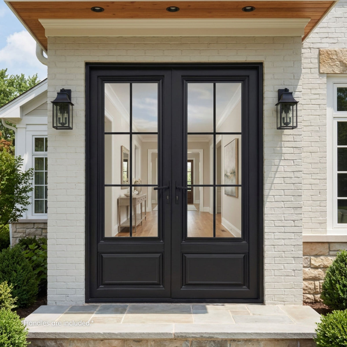 Alexus aluminum 6-lite double entry door, matte black finish with divided-lite clear glass, installed on a white brick home exterior