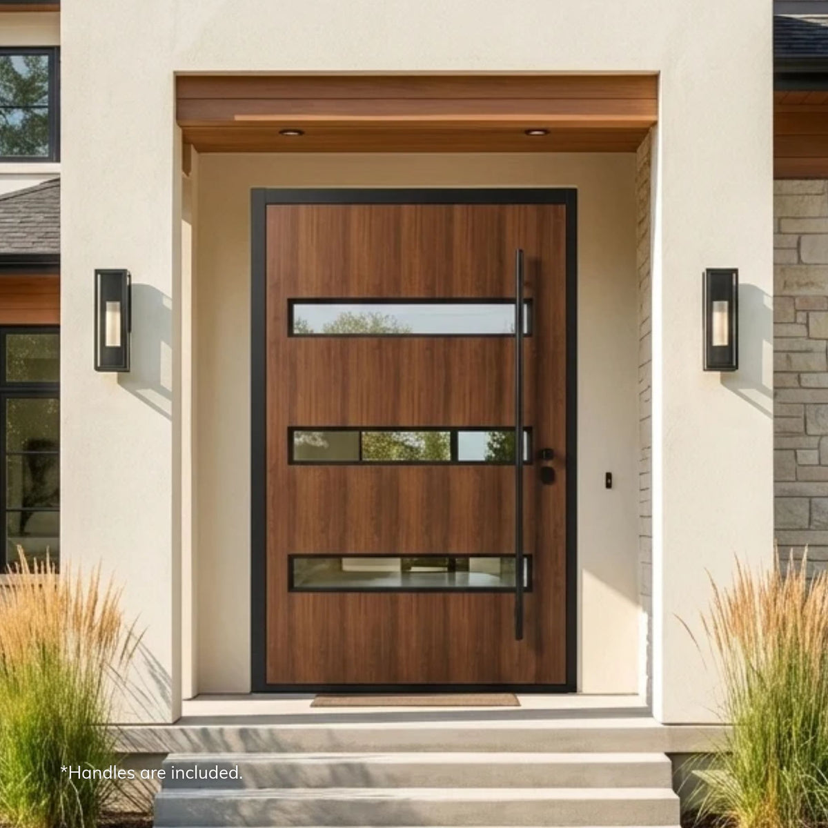 Alexues thermal break aluminum pivot entry door in a walnut wood-grain finish with a black frame, three horizontal clear glass lites, and a full-length pull handle, on a contemporary stucco and stone home