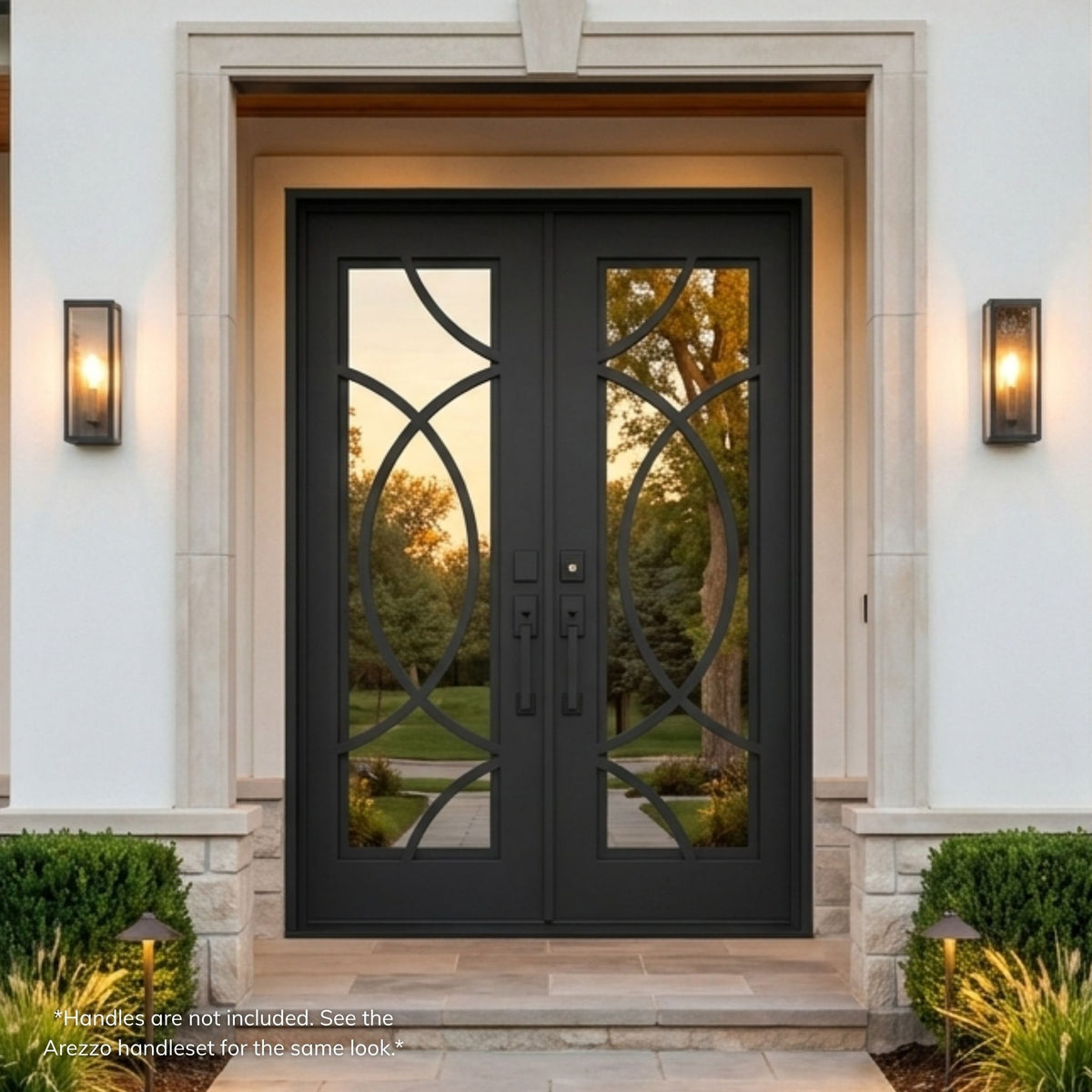 Bianca wrought iron double entry door, matte black finish with curved oval scrollwork and operable mirror glass, installed on a stucco home exterior