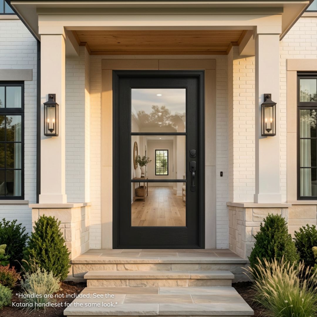 Fiberglass 3-lite single entry door, matte black finish with full-view clear glass, installed on a white brick modern home exterior with stone pillars and lantern sconces