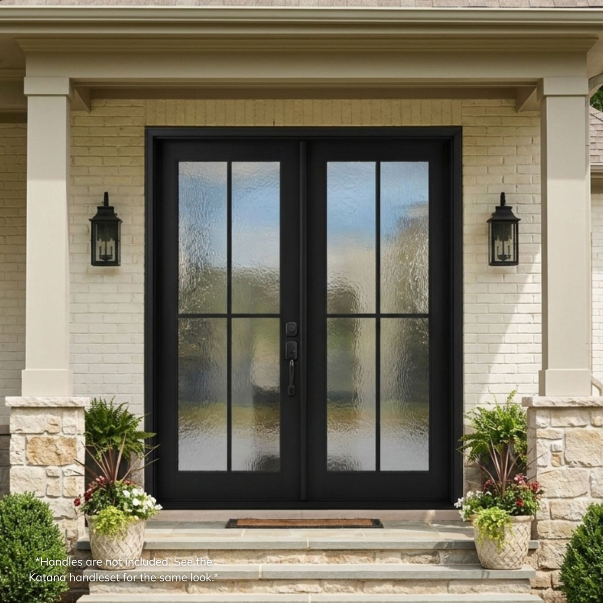 Fiberglass double entry door in a matte black finish, featuring a 4-lite SDL (simulated divided lite) water glass grille on each leaf over a raised panel, installed on a stone home with matching wall lanterns.