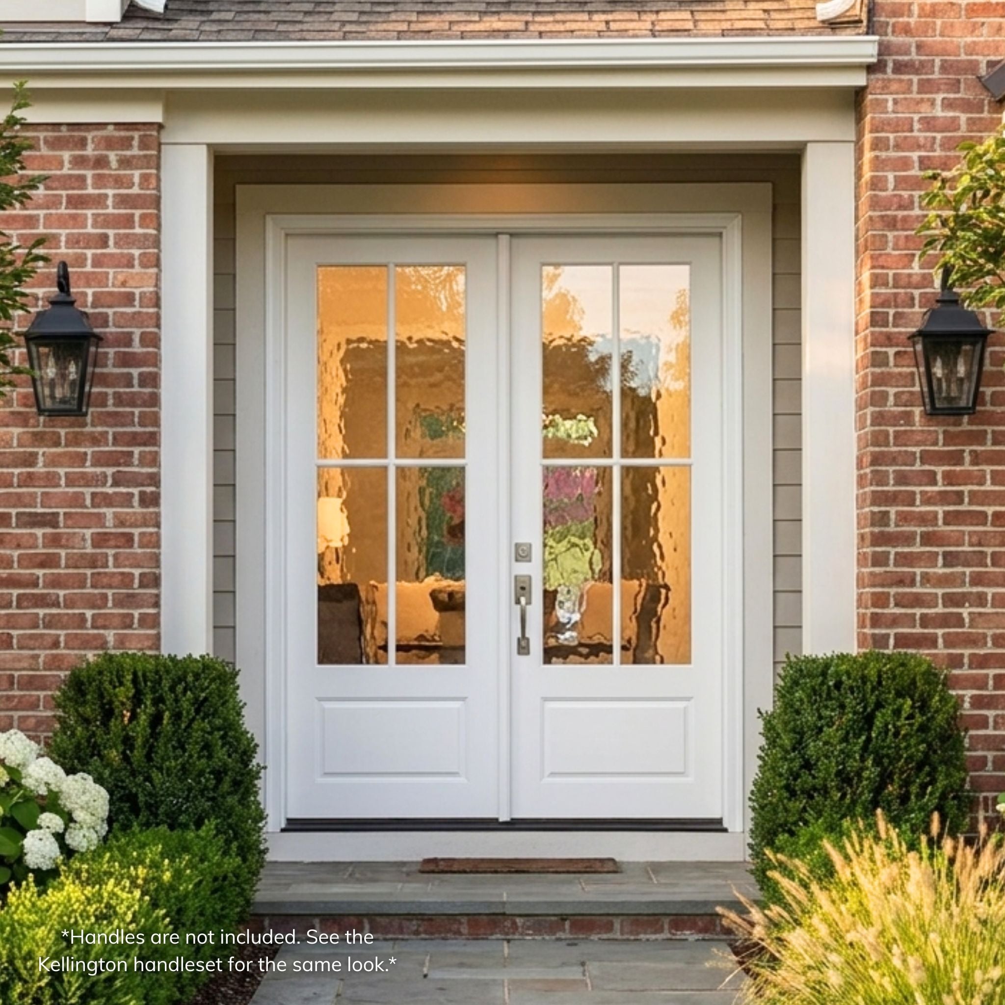 Fiberglass 4-lite SDL double entry door, primed white finish with Flemish glass, installed on a red brick home exterior with covered entry