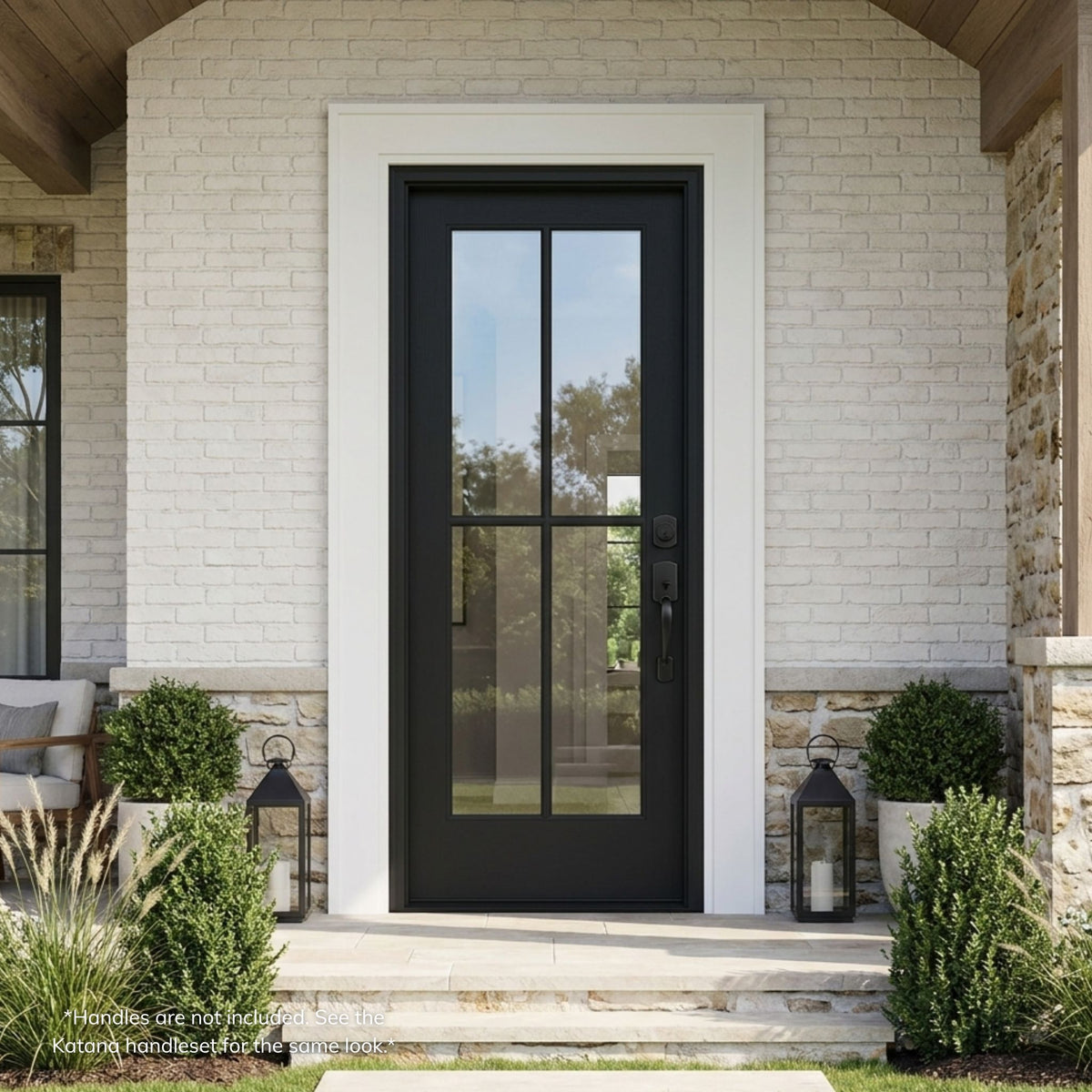 Fiberglass single entry door in a matte black finish with a 4-lite SDL (simulated divided lite) clear glass grille, installed on a white brick home.