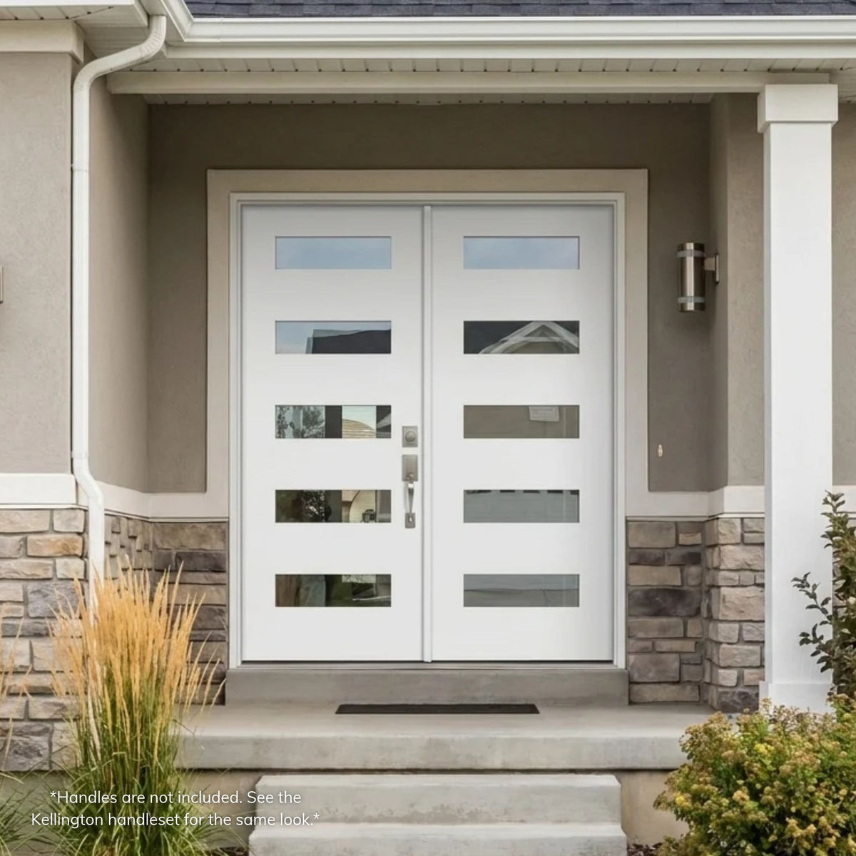 White fiberglass 5-lite double entry doors with clear glass on a modern stucco home with stone wainscot and a covered front entry