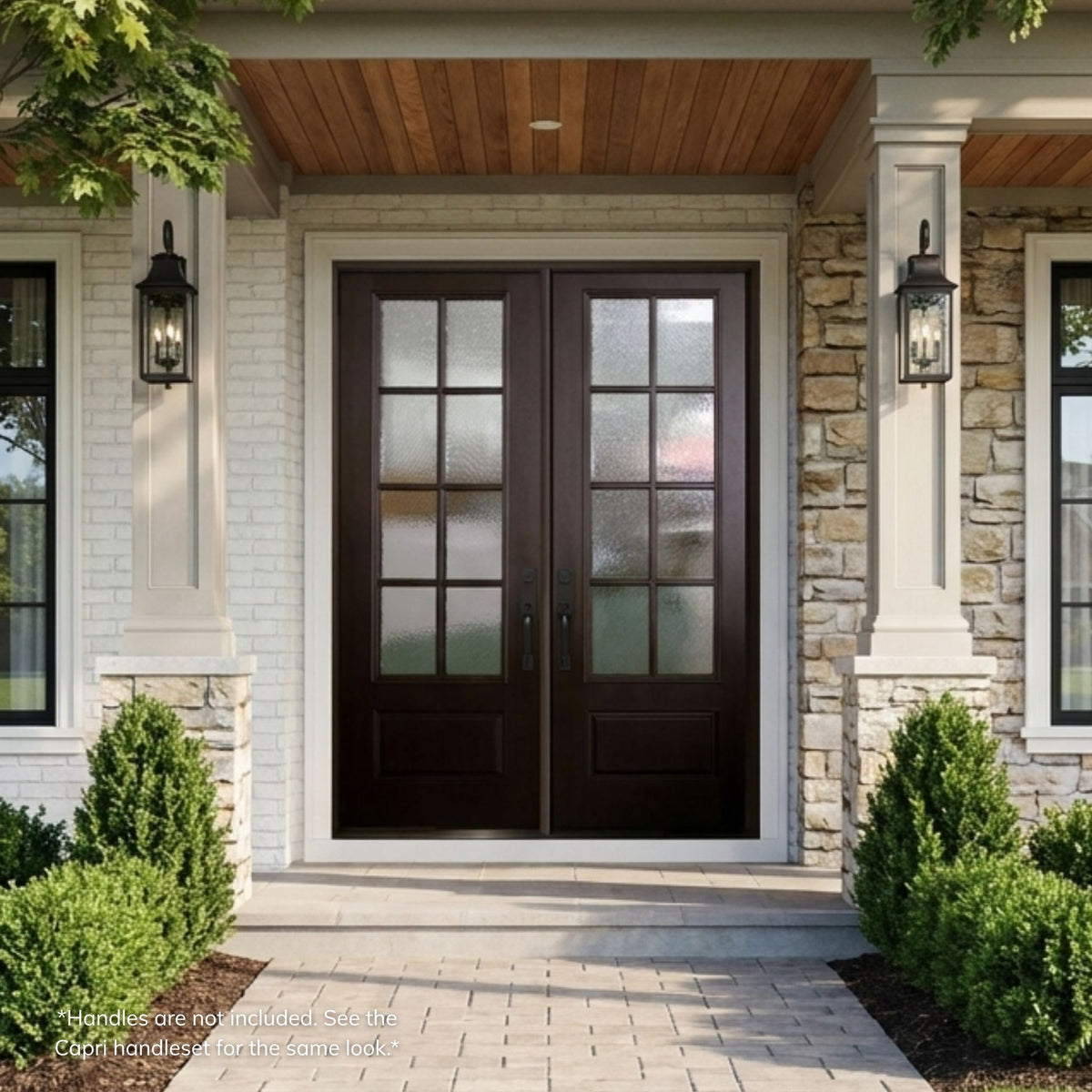 Fiberglass double entry door in a dark espresso finish with 8-lite divided glass panels and raised bottom panels, installed on a stone-accented home with a wood plank porch ceiling.