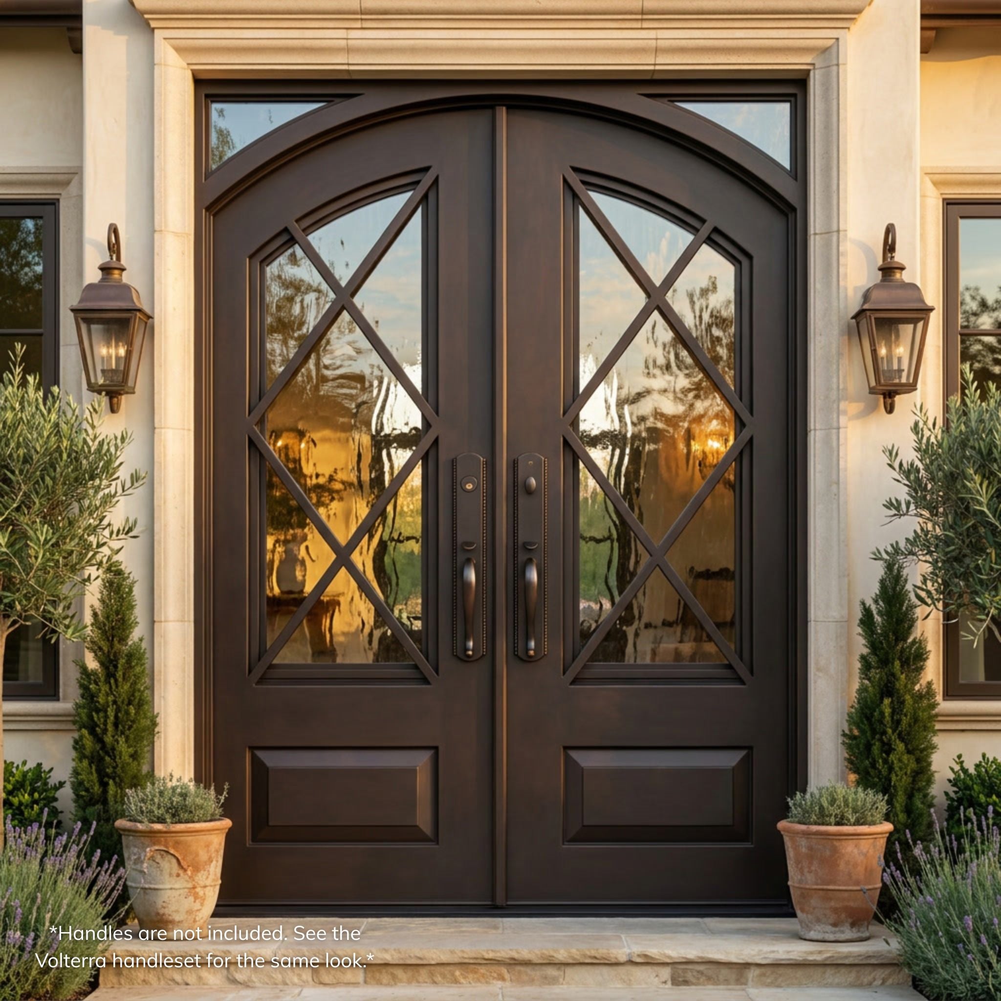 Helena wrought iron entry door, oil rubbed bronze finish, installed on a home, flemish glass pattern, diamond iron detailing