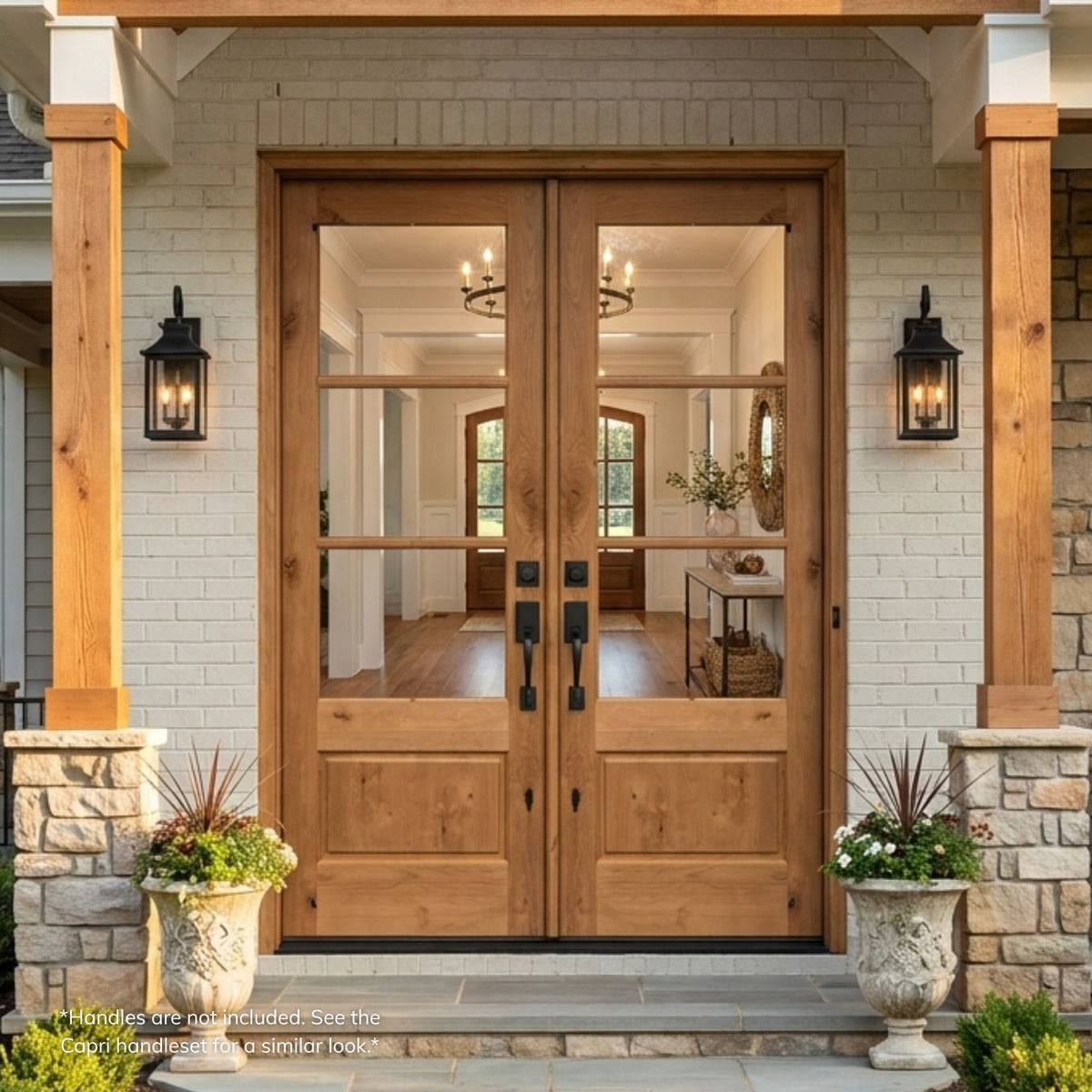 Knotty alder double entry door in a natural wood finish with 3-lite clear glass and visible knotty wood grain texture, installed on a stone and shingle home.