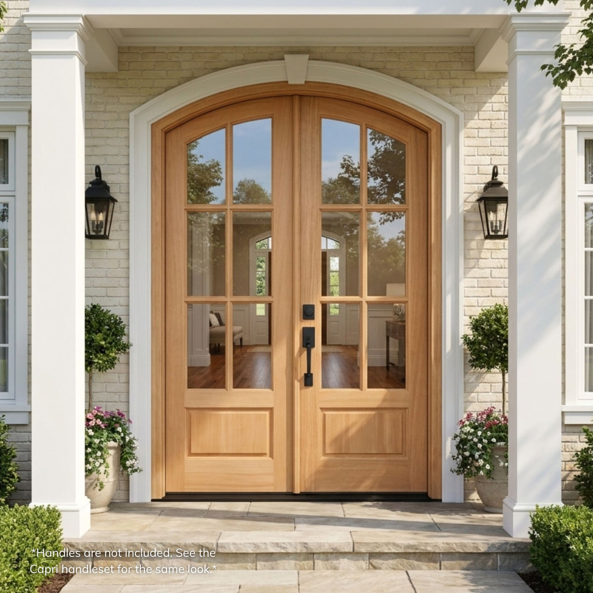 Mahogany 6-lite eyebrow top entry door, wood grain, unfinished, with clear glass, installed on a stone home exterior