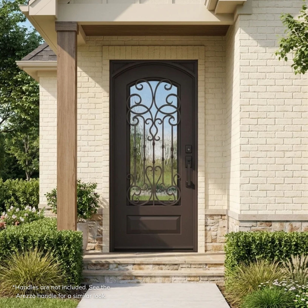 Portland dark bronze wrought iron single entry door with an arched top, scrollwork over Flemish glass, and a raised bottom panel, on a cream brick home with a covered entry and stone base