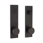 Seville door handleset in oil-rubbed bronze finish, square backplate with round flat knob, keyed deadbolt exterior and interior turn knob, shown as exterior and interior set