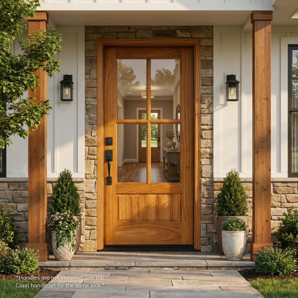 Weathercraft torrefied mahogany single entry door in a natural wood finish with 4-lite clear glass and matching sidelites, installed on a stone and brick craftsman-style home.