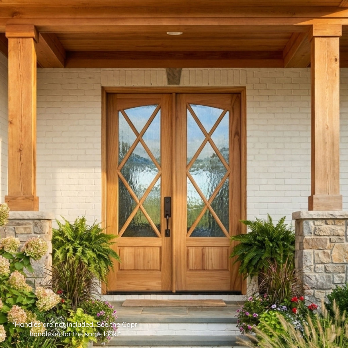 Weathercraft torrefied mahogany double entry door, wood grain finish with X-pattern muntin's and Flemish glass, arch-top design, installed on a craftsman-style stone and brick home exterior