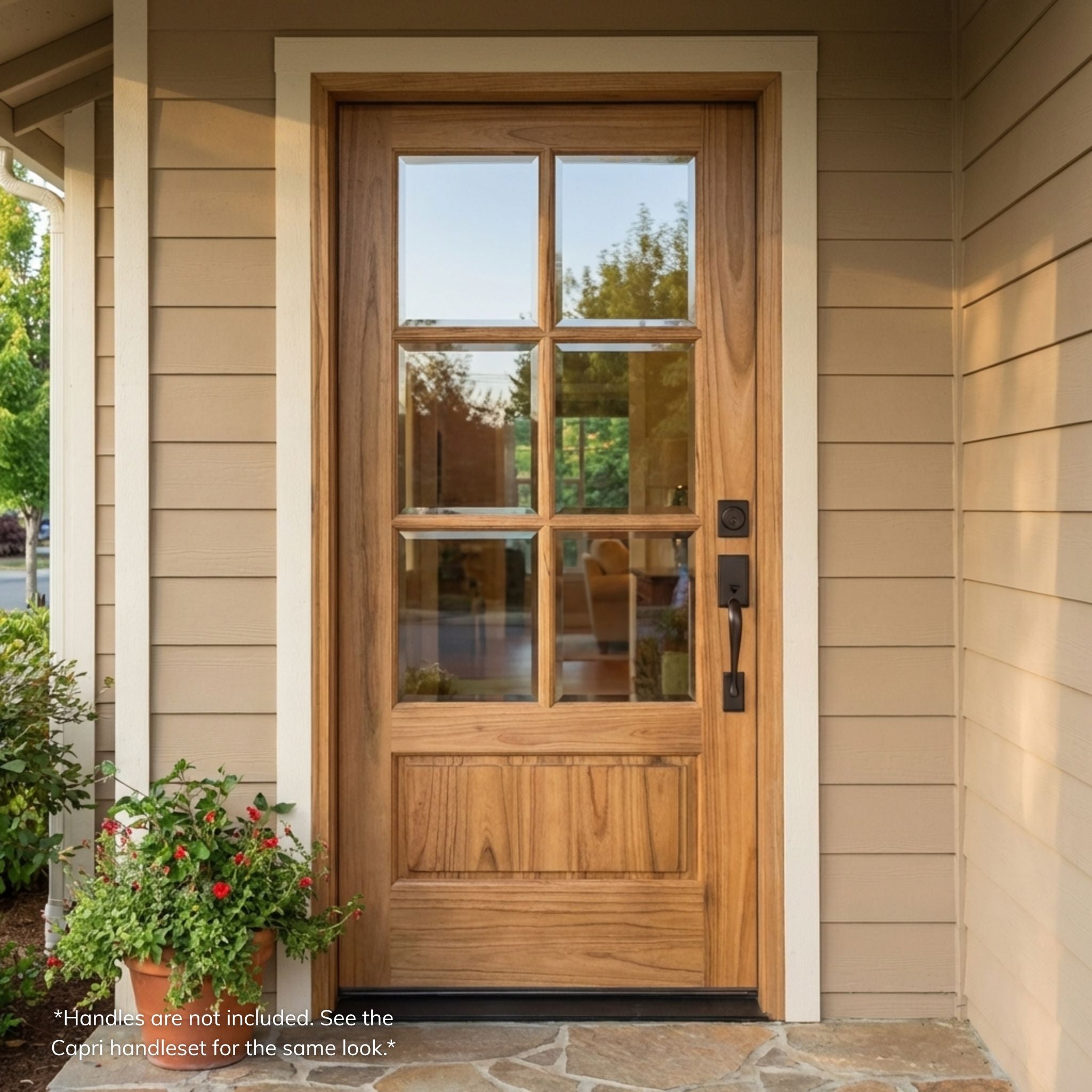 Weathercraft torrefied mahogany 6 lite single front entry door with clear glass, natural wood grain, decorative lower raised panel and black handleset installed on a residential home exterior