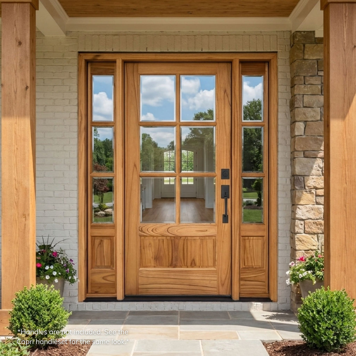 Weathercraft torrefied mahogany 6 lite front entry door with clear glass, matching 3 lite sidelites, natural wood grain, lower raised panels and black handleset on a covered home entry